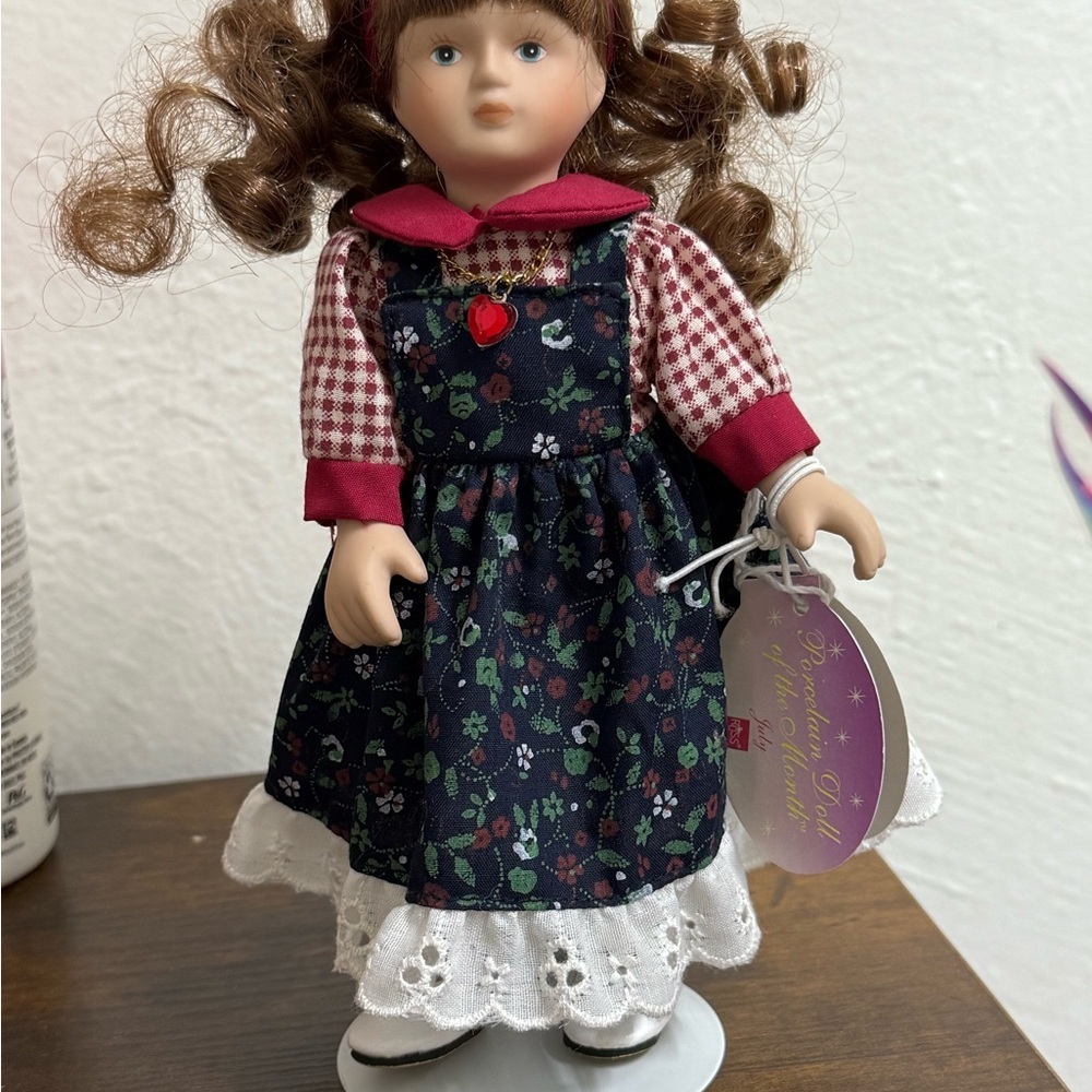 Russ Doll with Navy Floral Dress and Red Accents